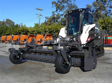 power rake skid steer attachment